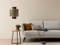 Gemütliches Wohnzimmer: Ein beiger Teppich und ein graues Sofa laden zum Entspannen ein. Beige und grau kombinieren wohnen stilvoll.