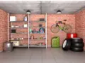 Coole Garagen Ideen: Ordnungssystem mit Regalen, Werkzeug, Ersatzteilen, Kanister, Reifen und einem Fahrrad.