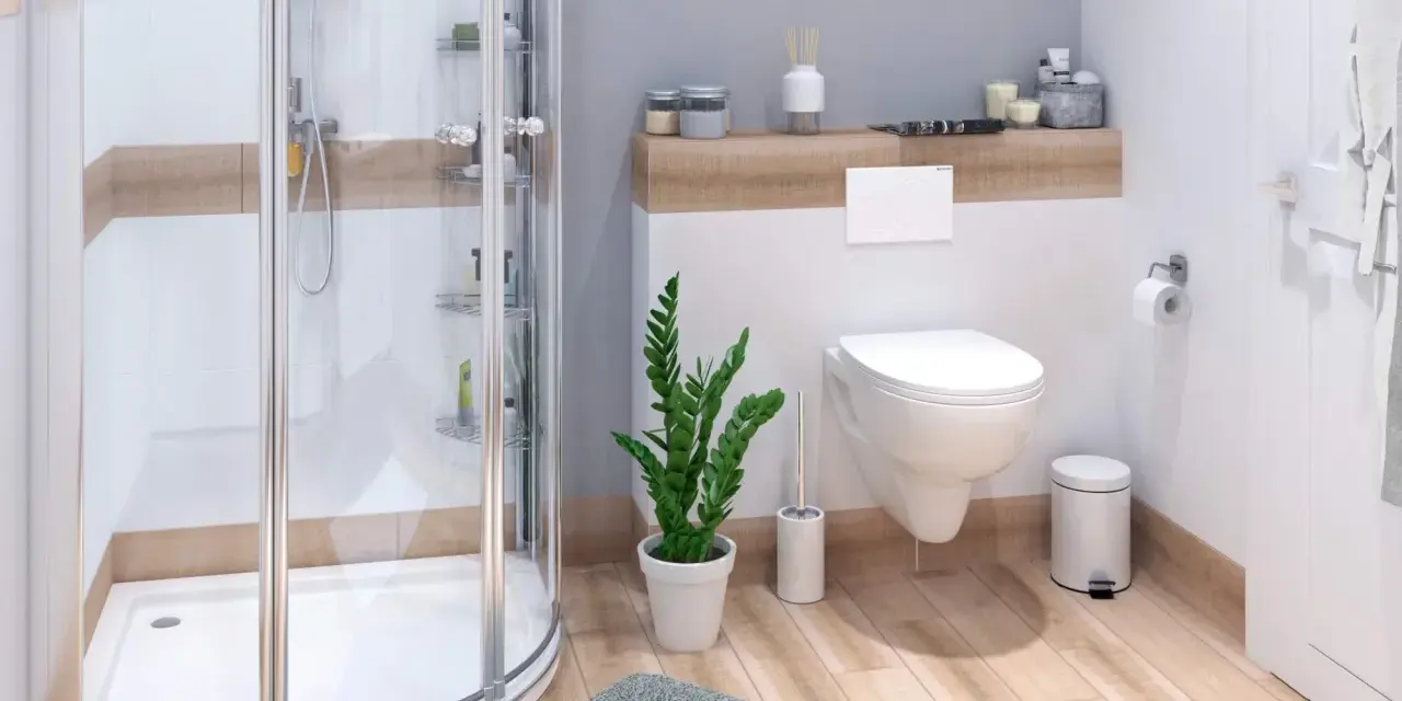 Ein kleines Badezimmer modern gestalten: Duschkabine, Hänge-WC, Pflanzen und Holzoptik schaffen eine Wohlfühloase.