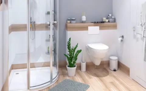 Ein kleines Badezimmer modern gestalten: Duschkabine, Hänge-WC, Pflanzen und Holzoptik schaffen eine Wohlfühloase.