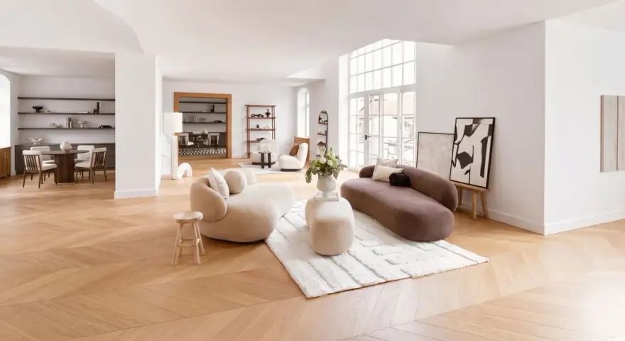 Ein helles Wohnzimmer mit organischen Sofas und einem Essbereich. Verschiedene einrichtungsstile arten werden hier modern interpretiert.