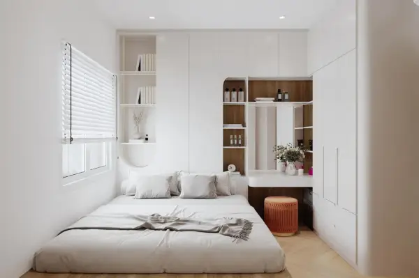 Moderne zimmer einrichten ideen: Ein helles Schlafzimmer mit weißem Bett, integrierten Regalen und einem Schminktisch.